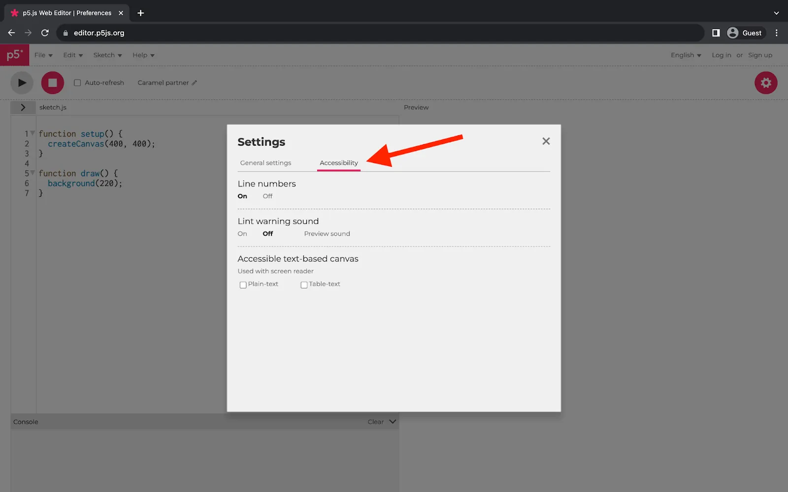 A web browser displaying the p5.js Web Editor. A square menu in the middle of the page displays accessibility settings. A red arrow points to the “Accessibility” tab near the top of the square menu.