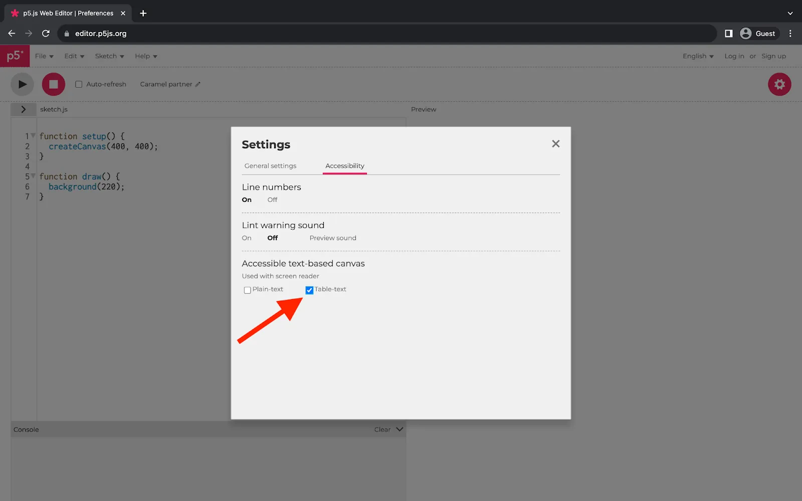 A web browser displaying the p5.js Web Editor. A square menu in the middle of the page displays accessibility settings. A red arrow points to the ‘Accessible text-based canvas’ section of the menu. The ‘Table-text’ option is checked.